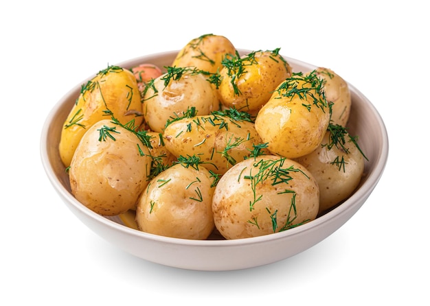 Gekookte ongeschilde aardappelen met verse dille en boter zijn geïsoleerd op een witte achtergrond