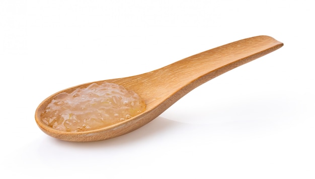 Gel aloe vera in wood spoon on white