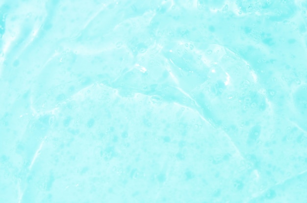 Фото Предпосылка текстуры сыворотки геля с прозрачным микро- пузырем. концепция ухода за кожей.