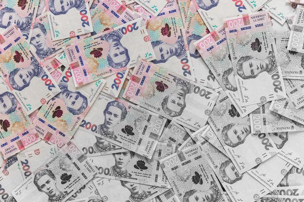 Geld van Oekraïne Stapel Oekraïense hryvnia bankbiljetten in handen Hryvnia 500