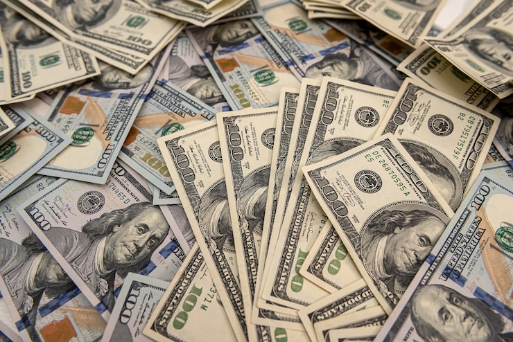 Foto geldachtergrond, amerikaanse dollarbiljetten