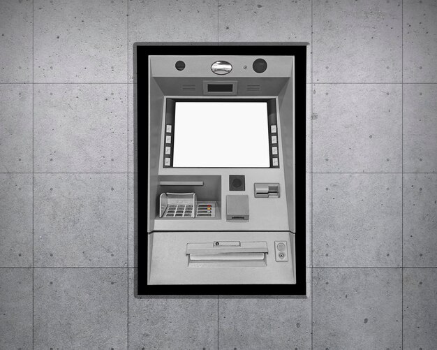 Foto geldautomaat op betonnen muur