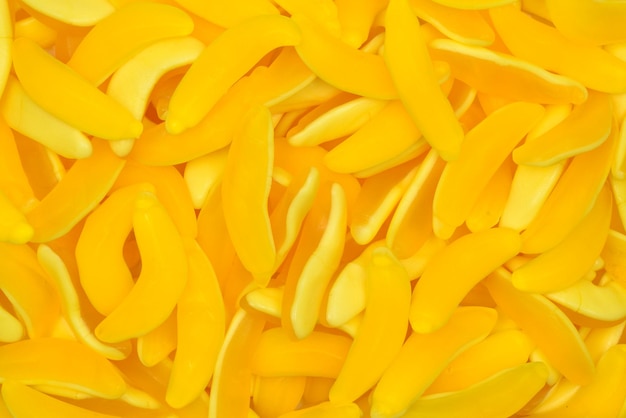 Gele gummy-snoepjes met banaan Bovenaanzicht Jelly-snoepjes