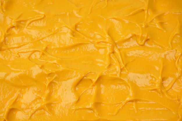 Gele saus als achtergrond