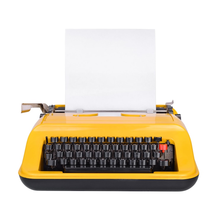 Foto gele schrijfmachine met kopie ruimte