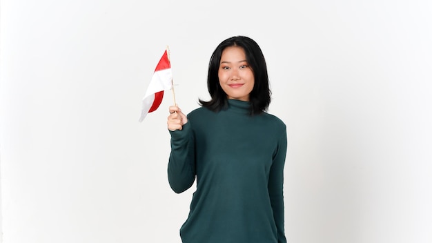 Gelukkig en houden Indonesische vlag Onafhankelijkheidsdag Concept van mooie Aziatische vrouw geïsoleerd op een witte achtergrond