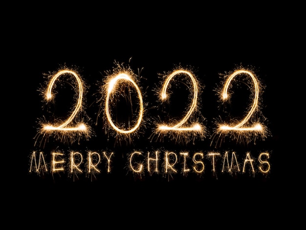 Gelukkig Nieuwjaar 2022 Sprankelende brandende tekst Gelukkig Nieuwjaar 2022 geïsoleerd op zwarte achtergrond
