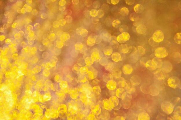 Gelukkig Nieuwjaar en Kerstmis wazig bokeh achtergrond Gouden abstracte achtergrond met bokeh lichten