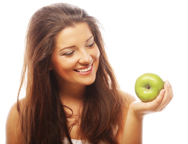 Gelukkige vrouw met groene appel