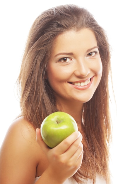 Gelukkige vrouw met groene appel