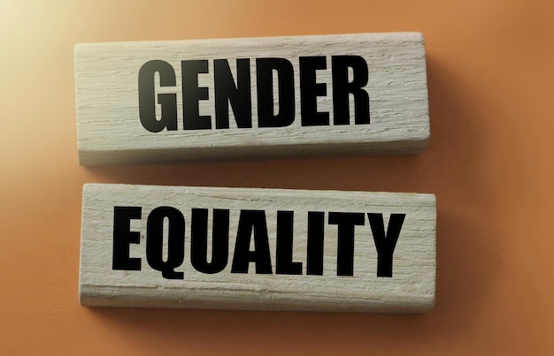 Gender equality words on wooden blocks equal rights for man and\
women concept