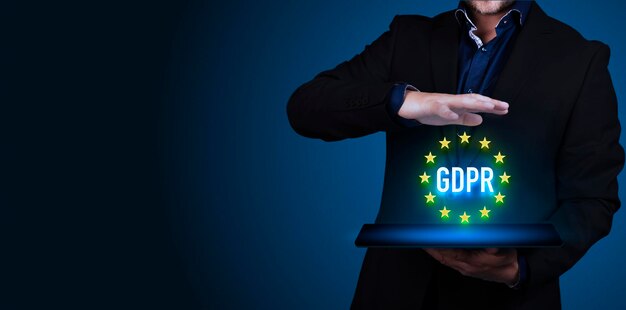 General data protection regulation, gdpr, european data privacy
act. businessman holds a tablet computer with gdpr test. copy
space. high quality photo