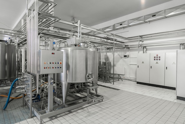 General view of the interior of a milk factory. equipment at the dairy plant