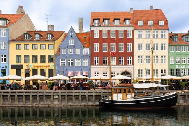 General view of the main street of Nyhavn neighborhood in Copenhagen Denmark