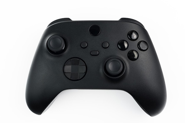 Next generation black game controller isolated on white background.