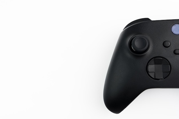 Next generation black game controller isolated on white background.