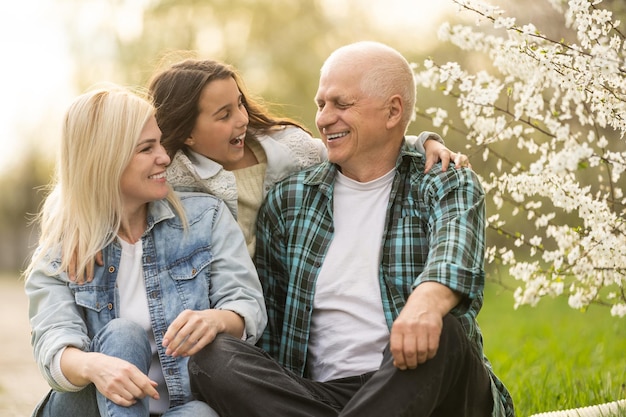 Generation Family On Grass Together in the garden