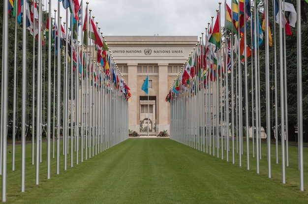 Geneva, Switzerland - July 1, 2017: National flags at the entrance in UN office at Geneva, Switzerland. The United Nations was established in Geneva in 1947 and is the second largest UN office