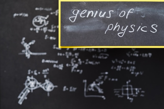 Genius of physics exact sciences and academic research blurred formula written on chalkboard