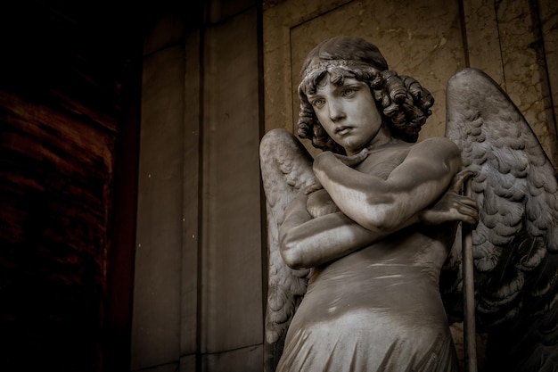 GENOA, ITALY - CIRCA AUGUST 2020: Angel sculpture by Giulio Monteverde for the Oneto family monument in Staglieno Cemetery, Genoa - Italy (1882)