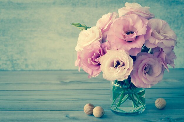 Gentle Flowers in a glass vase with copy space vintage still life