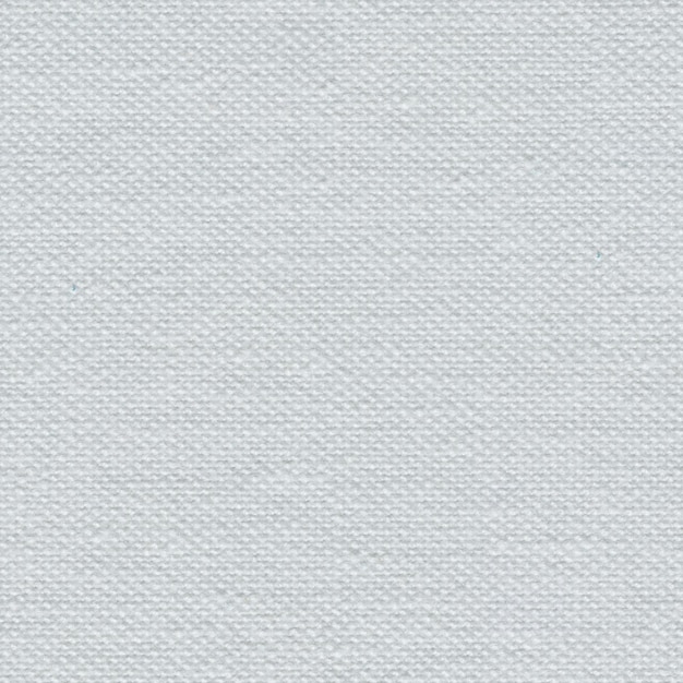 Photo gentle light gray fabric background on macro for design