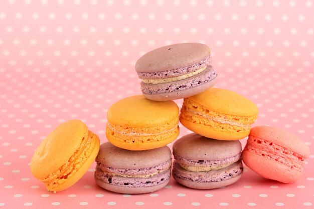 Gentle macaroons on pink background