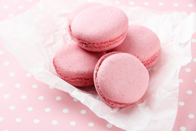 Gentle macaroons on table closeup