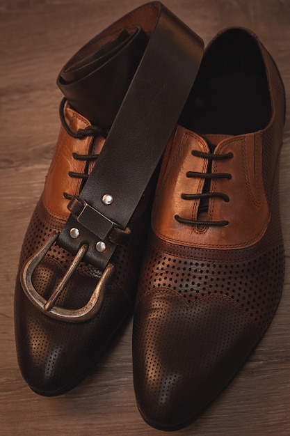 Gentleman's set of accessories. Shoes with belt