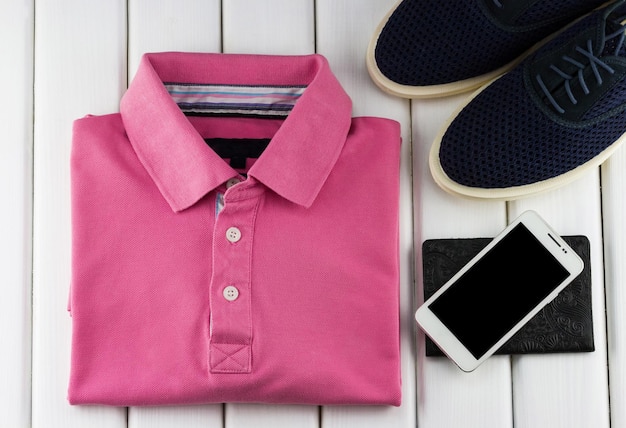 Gentleman's set of tshirt with shoes and smartphone