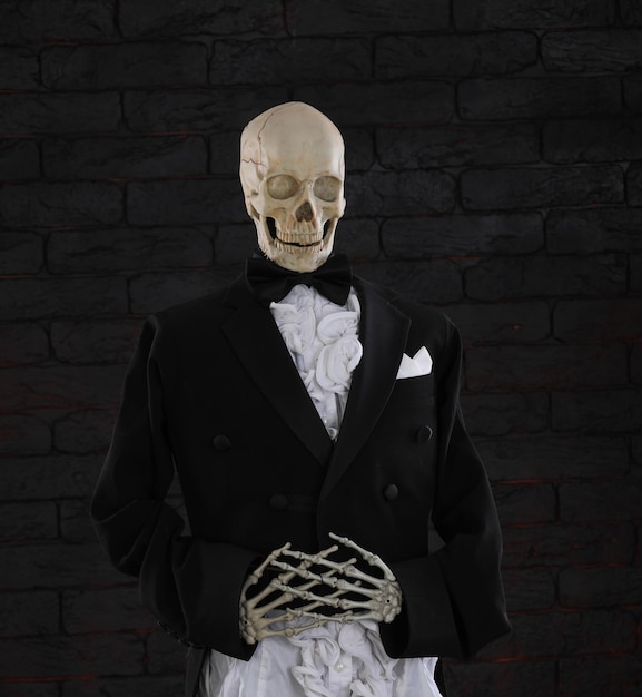 gentleman skeleton on a black background