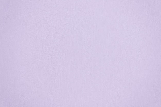 Photo gently lilac purple background plaster wall.