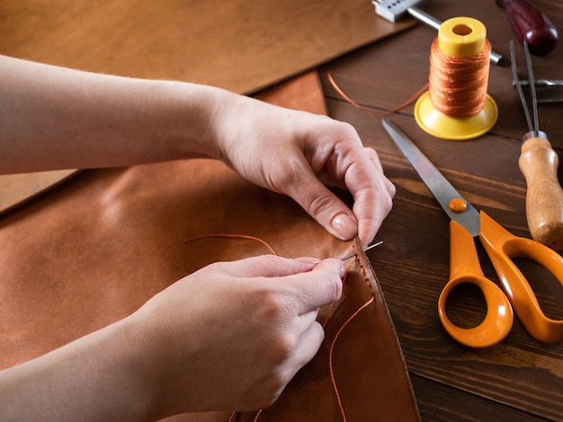 Genuine Leather. Sewing products from genuine leather. Tools.