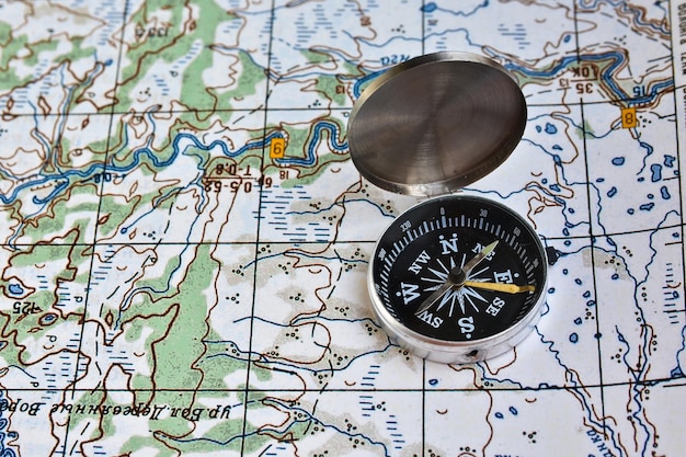 Geographical map and a compass