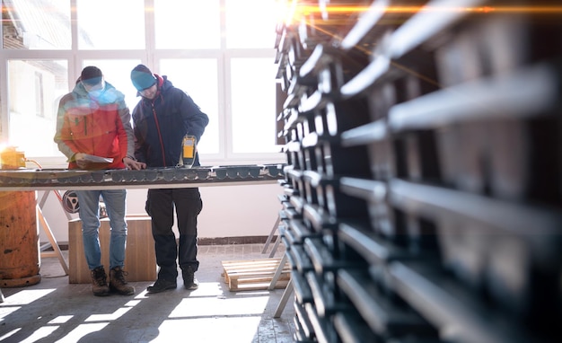 geological gold core samples with team of mining  workers measuring drilled rock