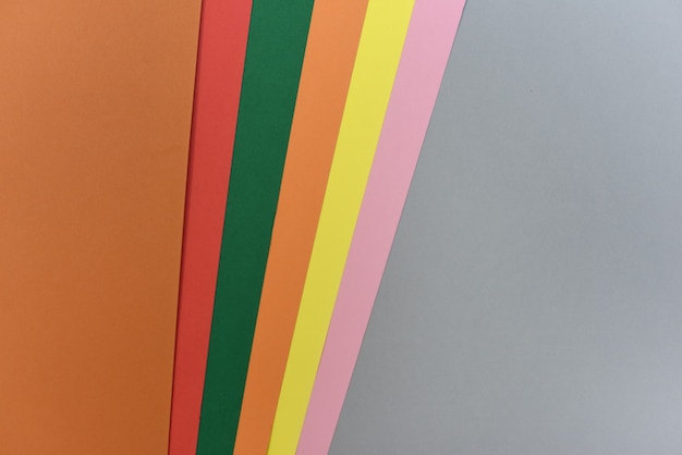 Геометрический фон с текстурированной цветной бумагой, серая основа с коричневыми и оранжевыми цветами