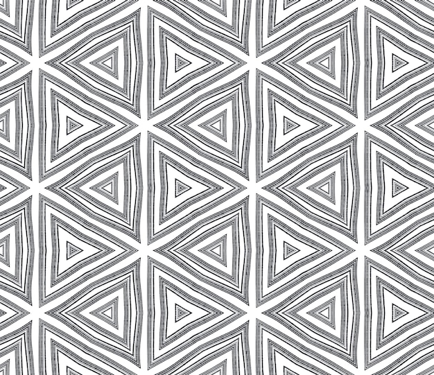 Geometric seamless pattern. Black symmetrical kaleidoscope background. Hand drawn geometric seamless design. Textile ready fine print, swimwear fabric, wallpaper, wrapping.