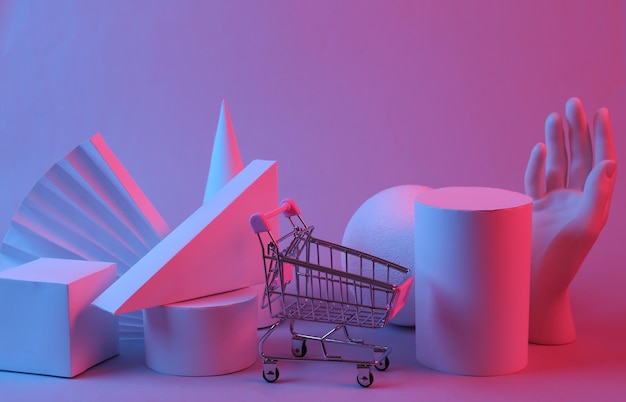 Геометрические формы и тележка для покупок в красно-синем градиентном свете Сюрреализм Концепт-арт ретро-футуризм минимализм