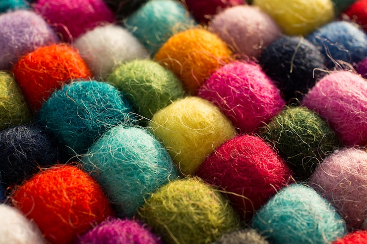 Photo geometric  with balls of colored synthetic wool