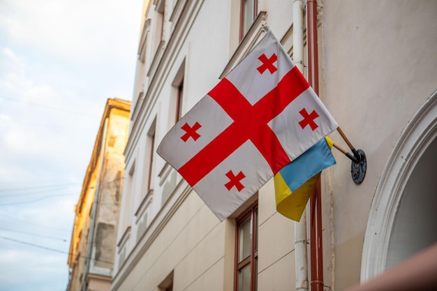 Georgia and ukraine flag on the wall copy space