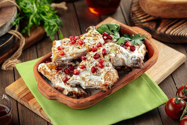 Georgian dish chkmeruli chicken with cream