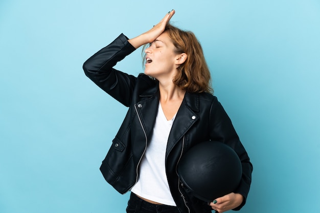 Georgian girl holding a motorcycle helmet isolated