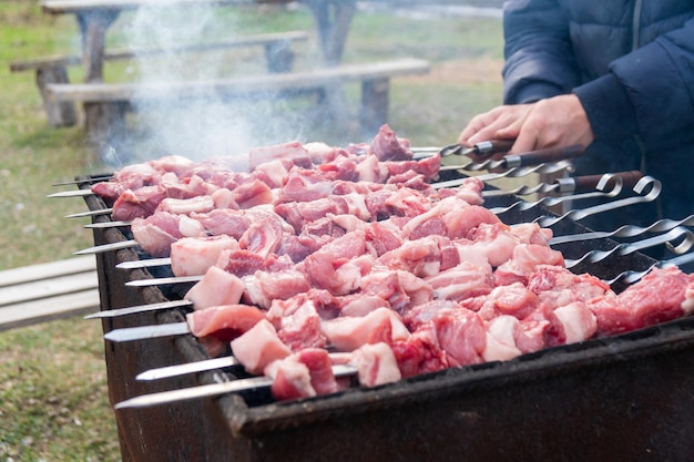 Georgian mtsvadi Shashlik preparation Smoking shashlik on the grill