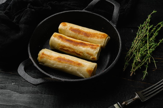 Georgian pancake on black wooden table background