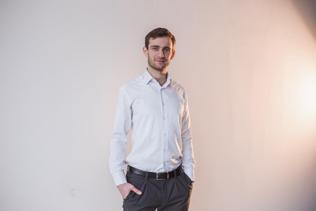 Georgian teacher standing near the white wall