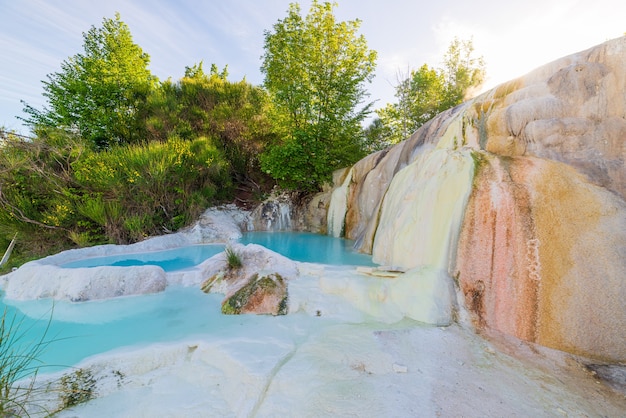 Geothermal natural pool and hot spring waterfall landscape