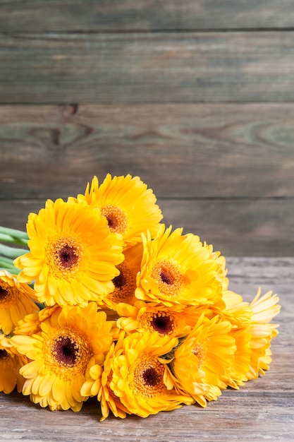 Gerbera flowers on wooden, floral vintage