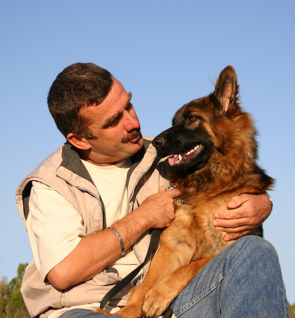 German shepherd and man