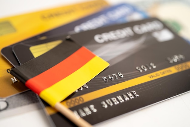 Germany flag on credit card. Finance development, Banking Account, Statistics, Investment Analytic research data economy, Stock exchange trading, Business company concept.