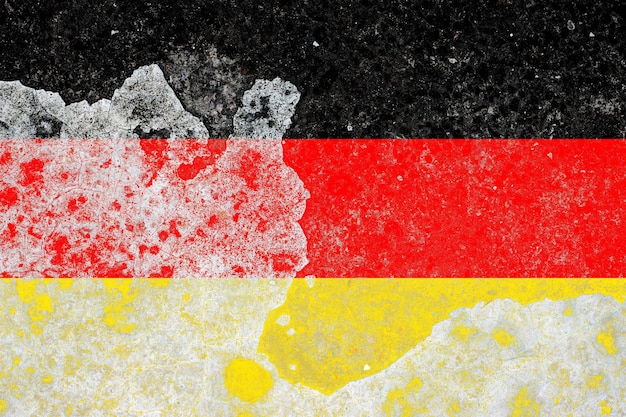 Germany flag on a damaged old concrete wall surface